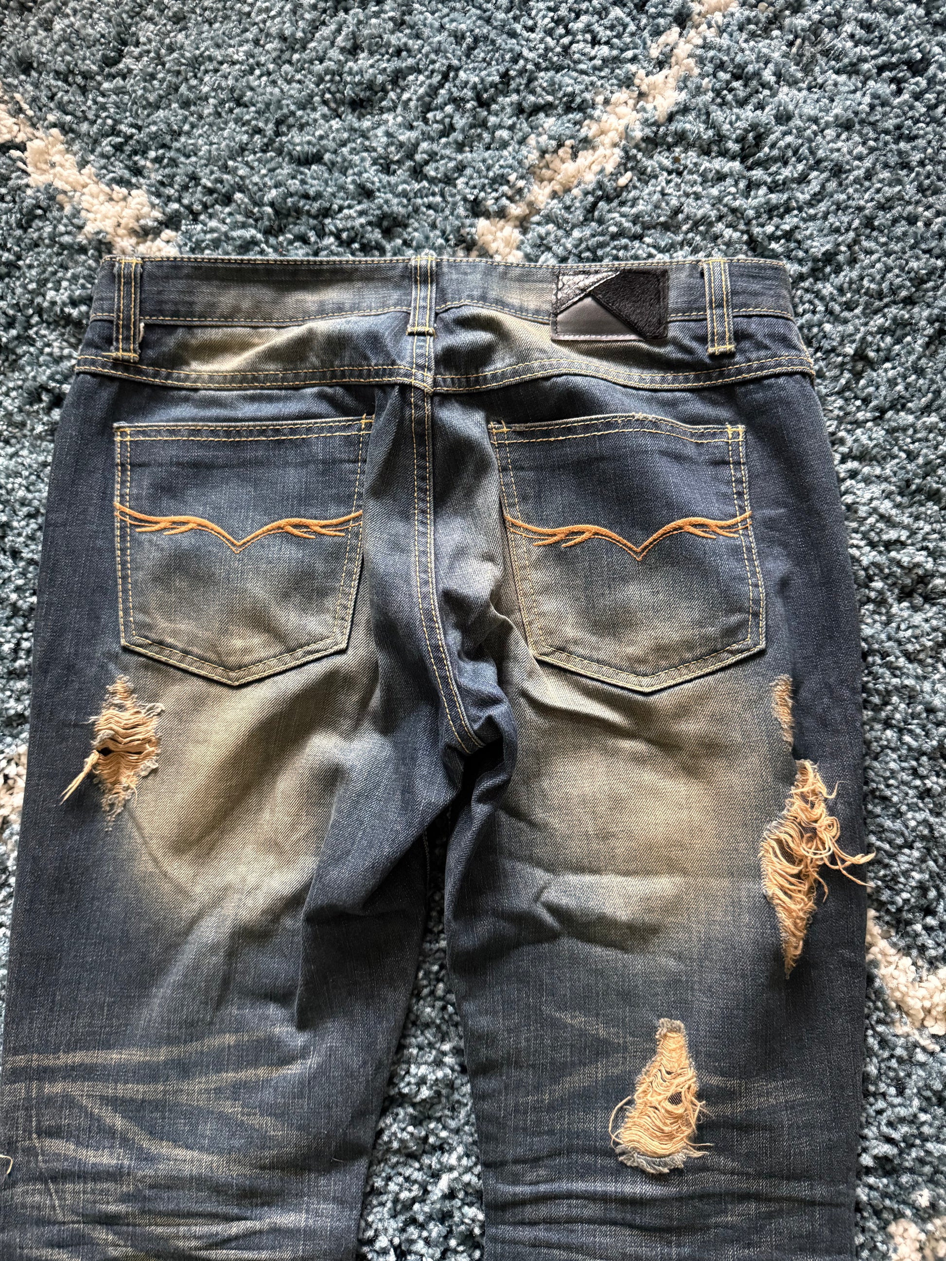 FUGA crashed distressed ponyhair&snakeskin patch flared denim
