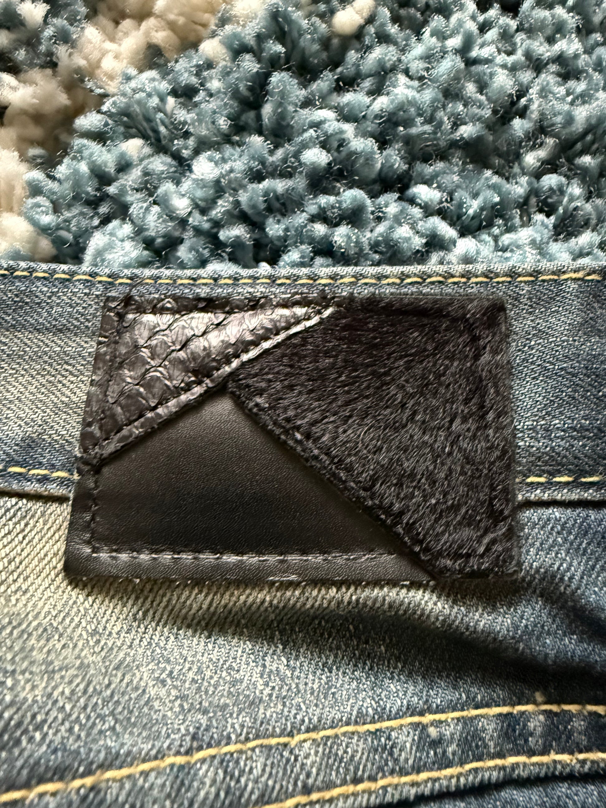FUGA crashed distressed ponyhair&snakeskin patch flared denim