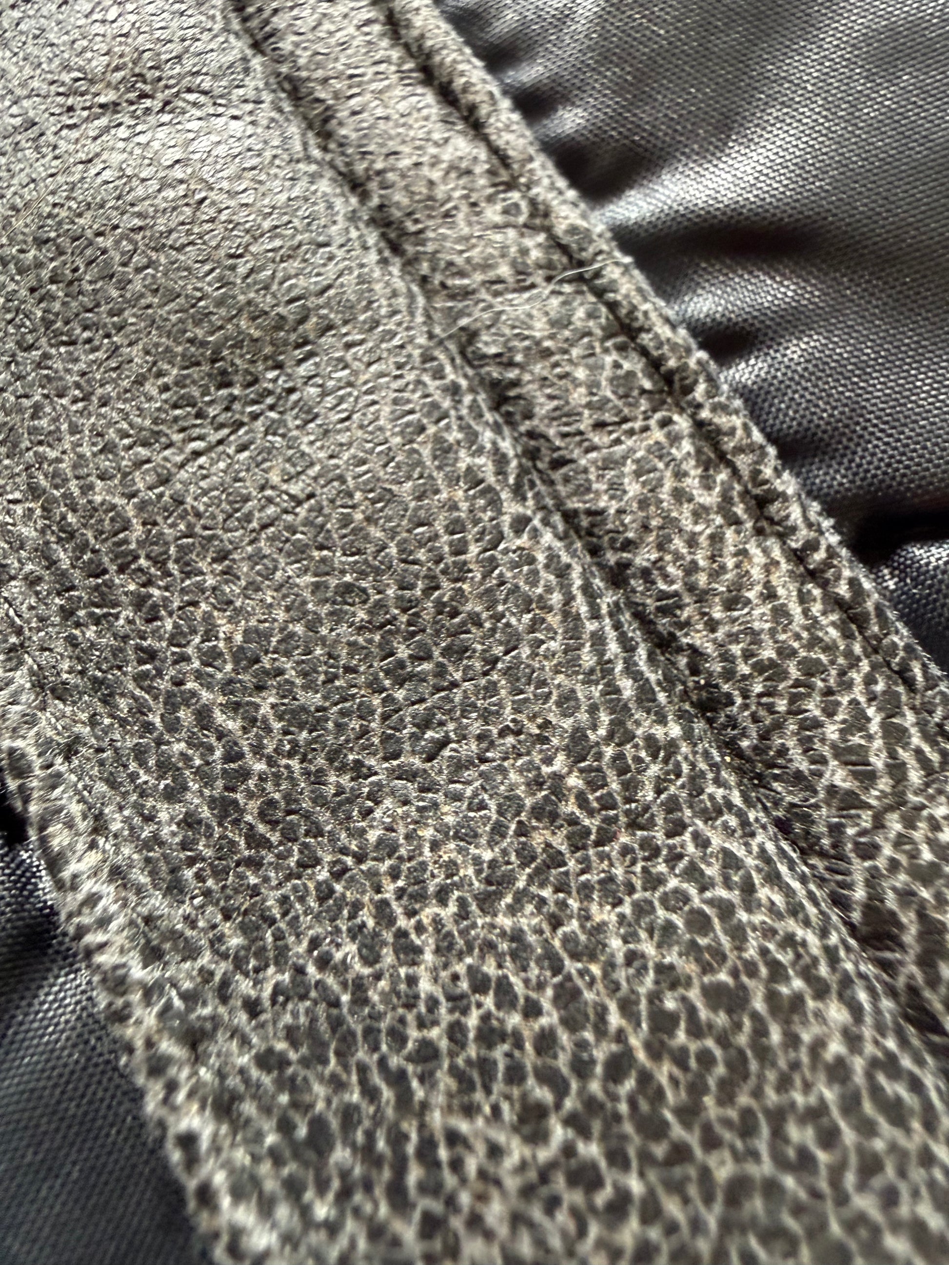 Tornado Mart Leather strap details puffer