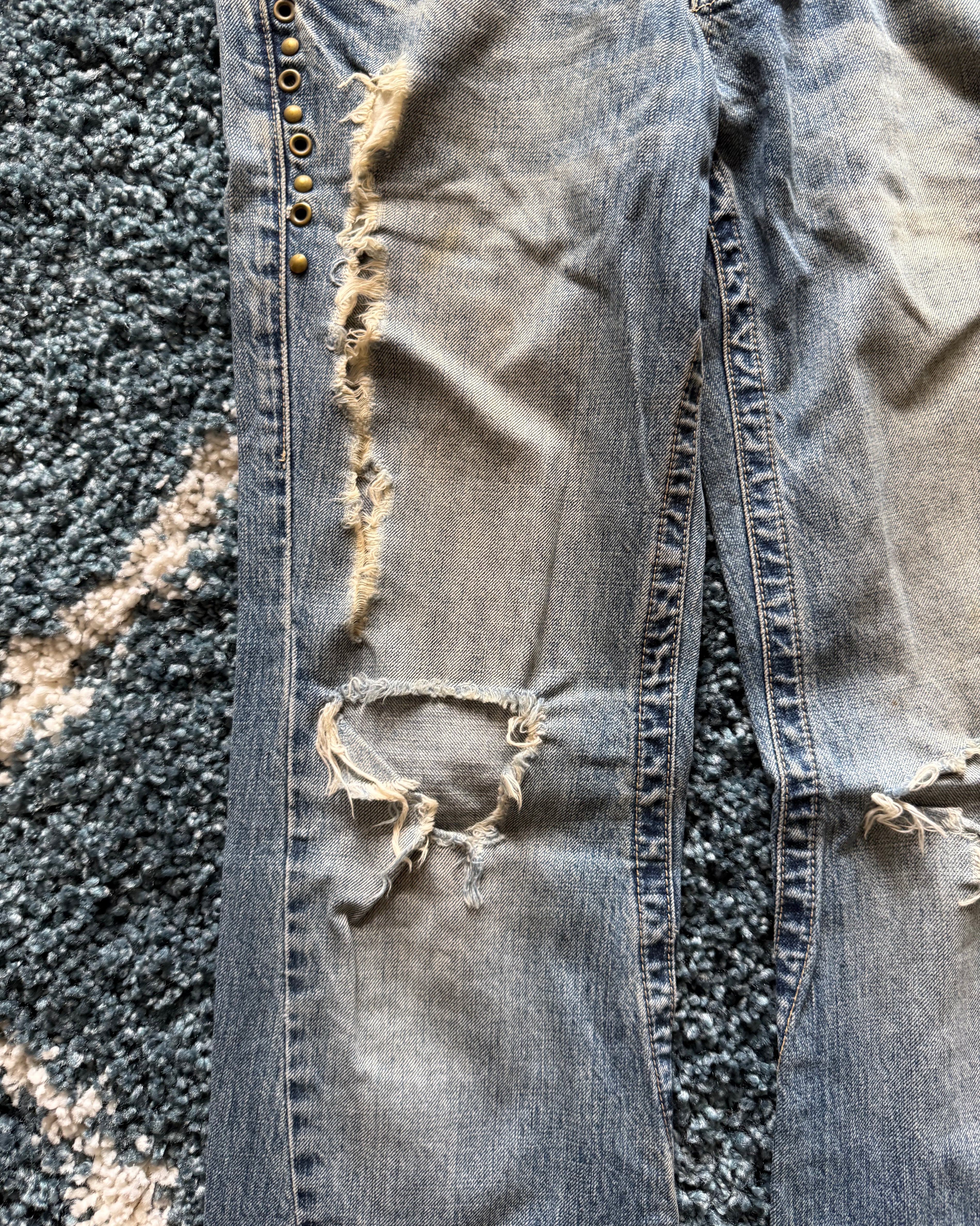 Tornado Mart spiral distressed studded flared denim