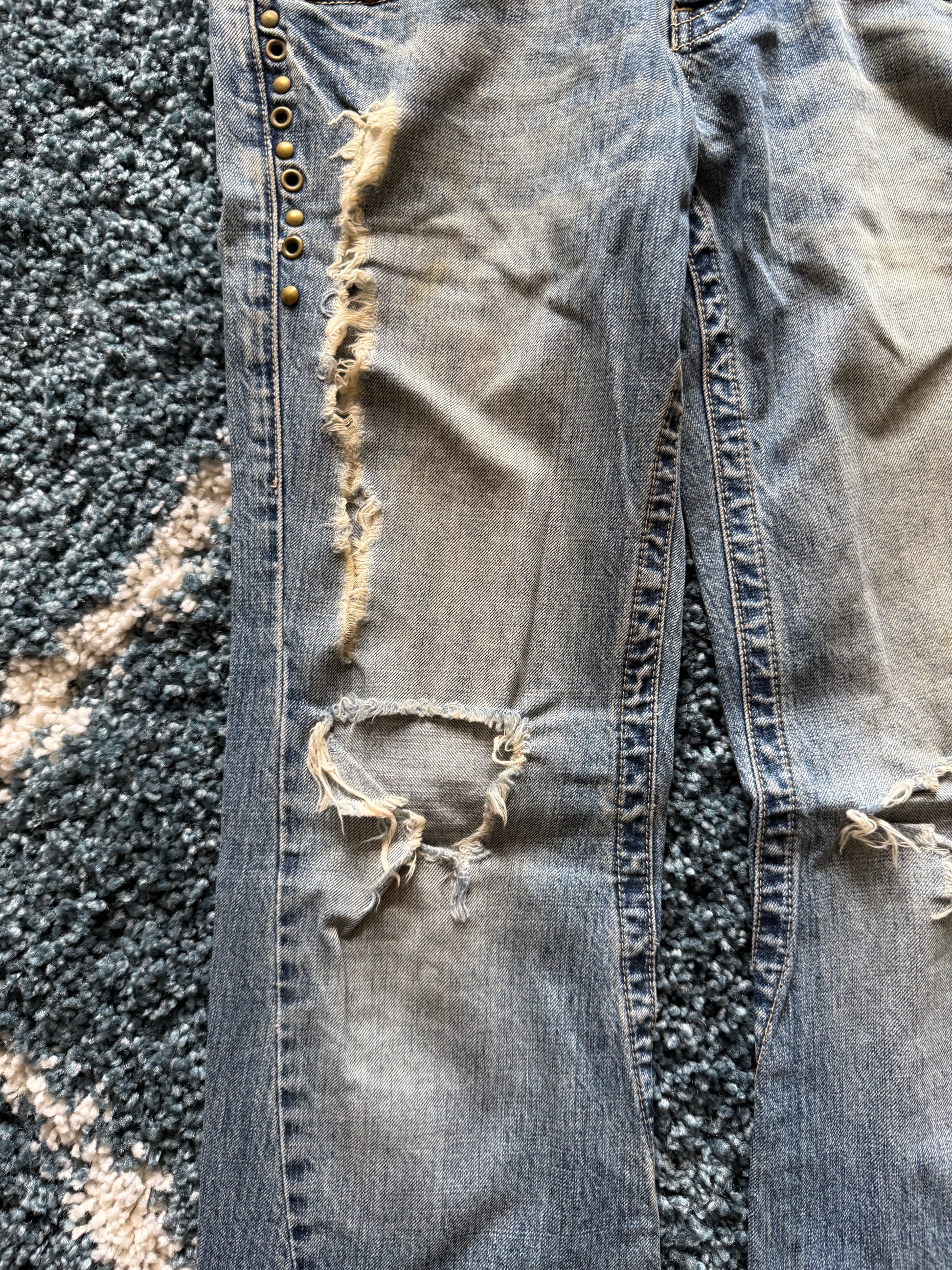 Tornado Mart spiral distressed studded flared denim