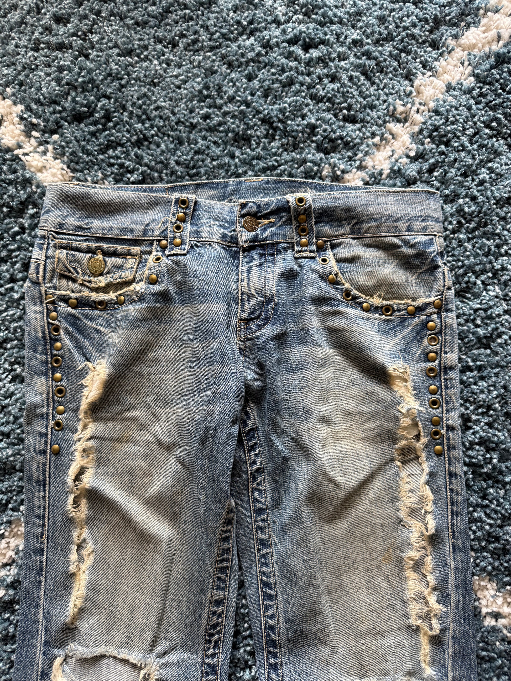 Tornado Mart spiral distressed studded flared denim