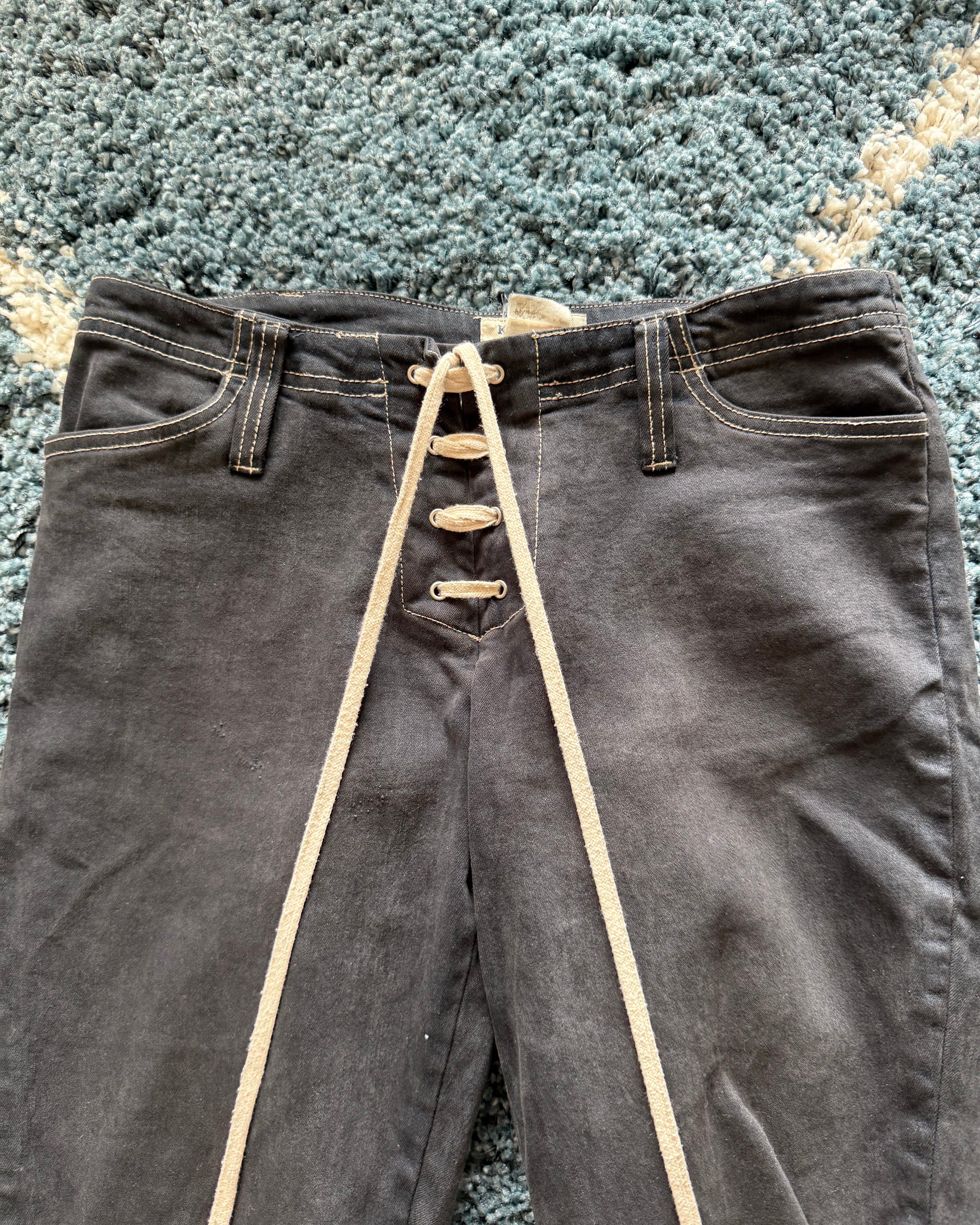 KIE Laced up leather pockets flared jeans