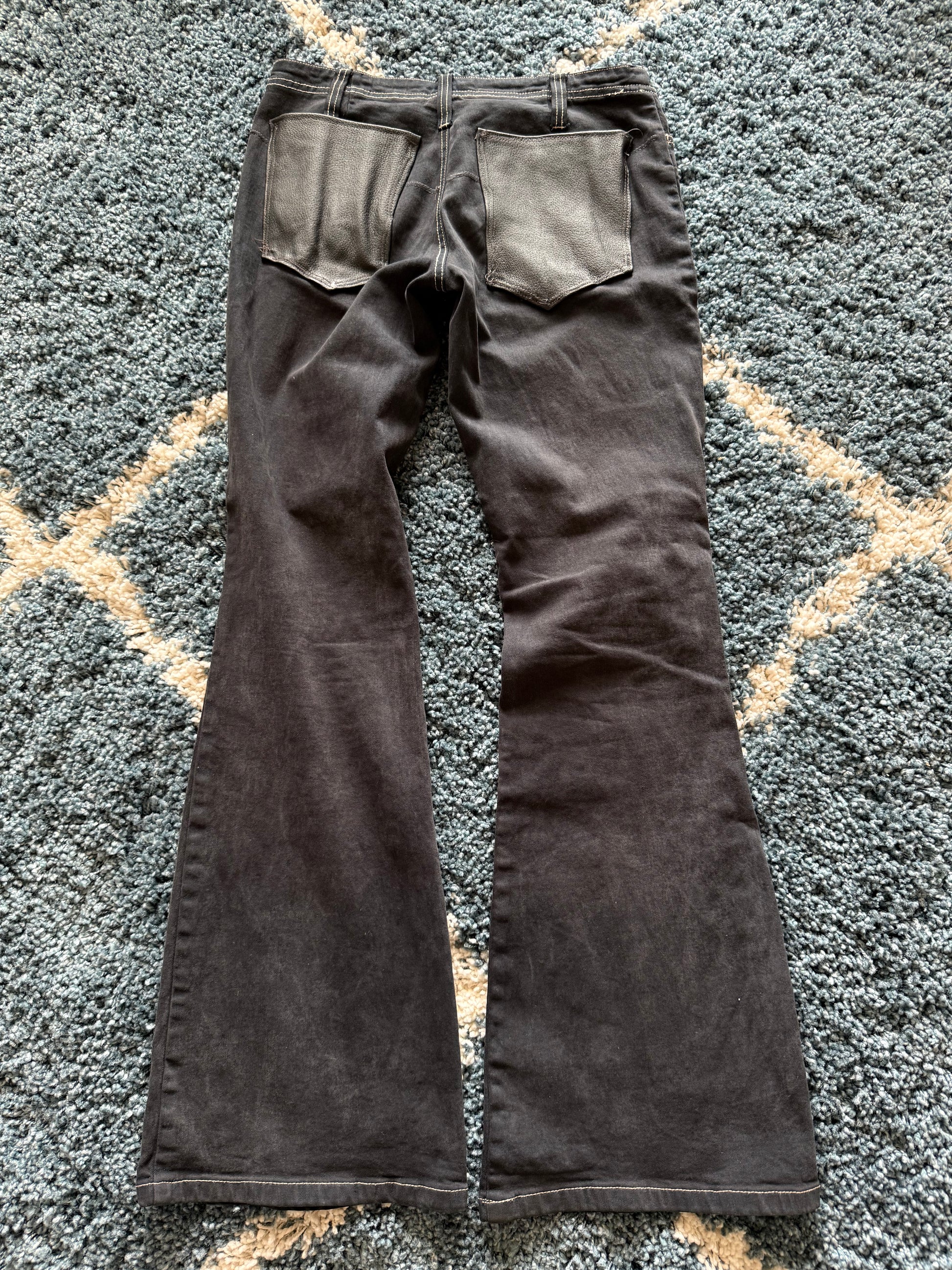 KIE Laced up leather pockets flared jeans