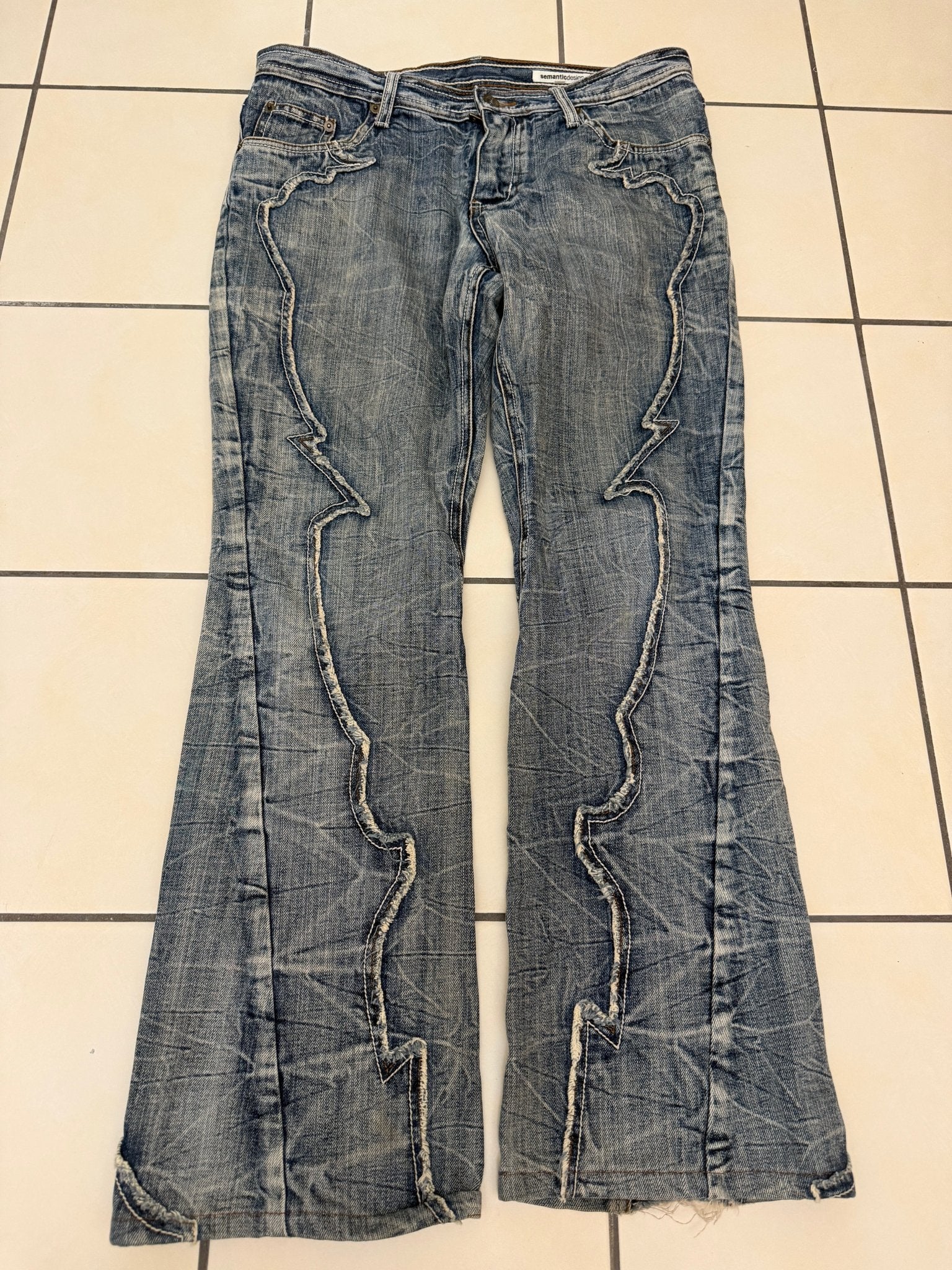 Semantic Design Spiral Studded Flared Pants - wintexarchive