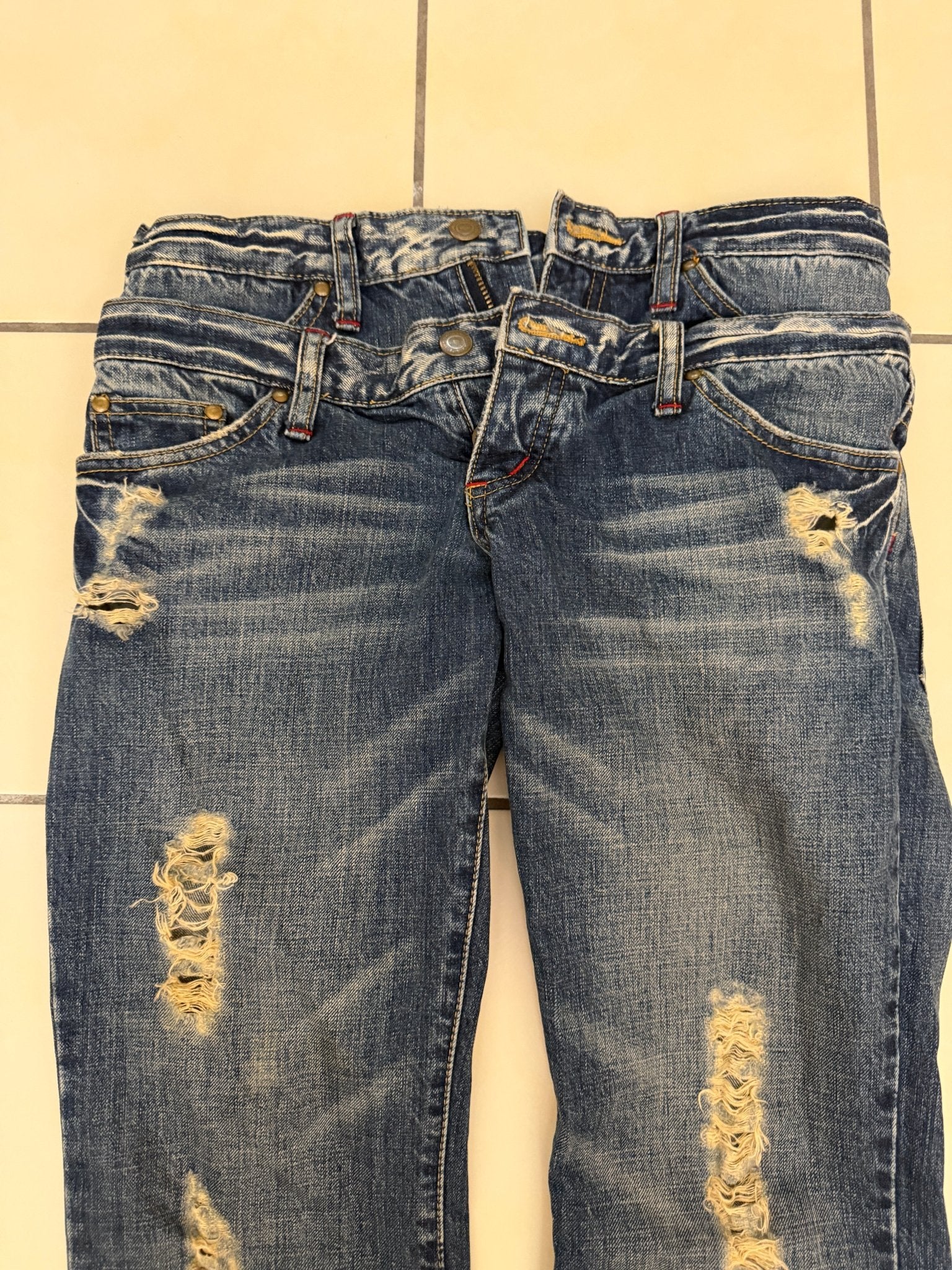 Tornado Mart Double Waisted Distressed Flared Pants - wintexarchive