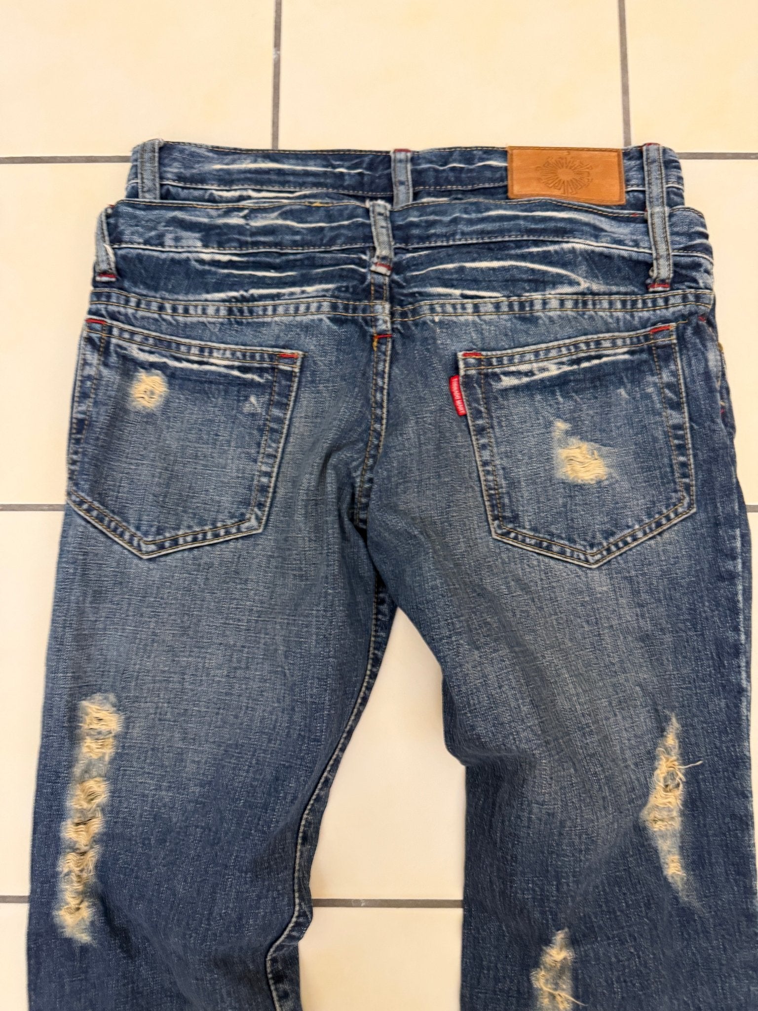 Tornado Mart Double Waisted Distressed Flared Pants - wintexarchive