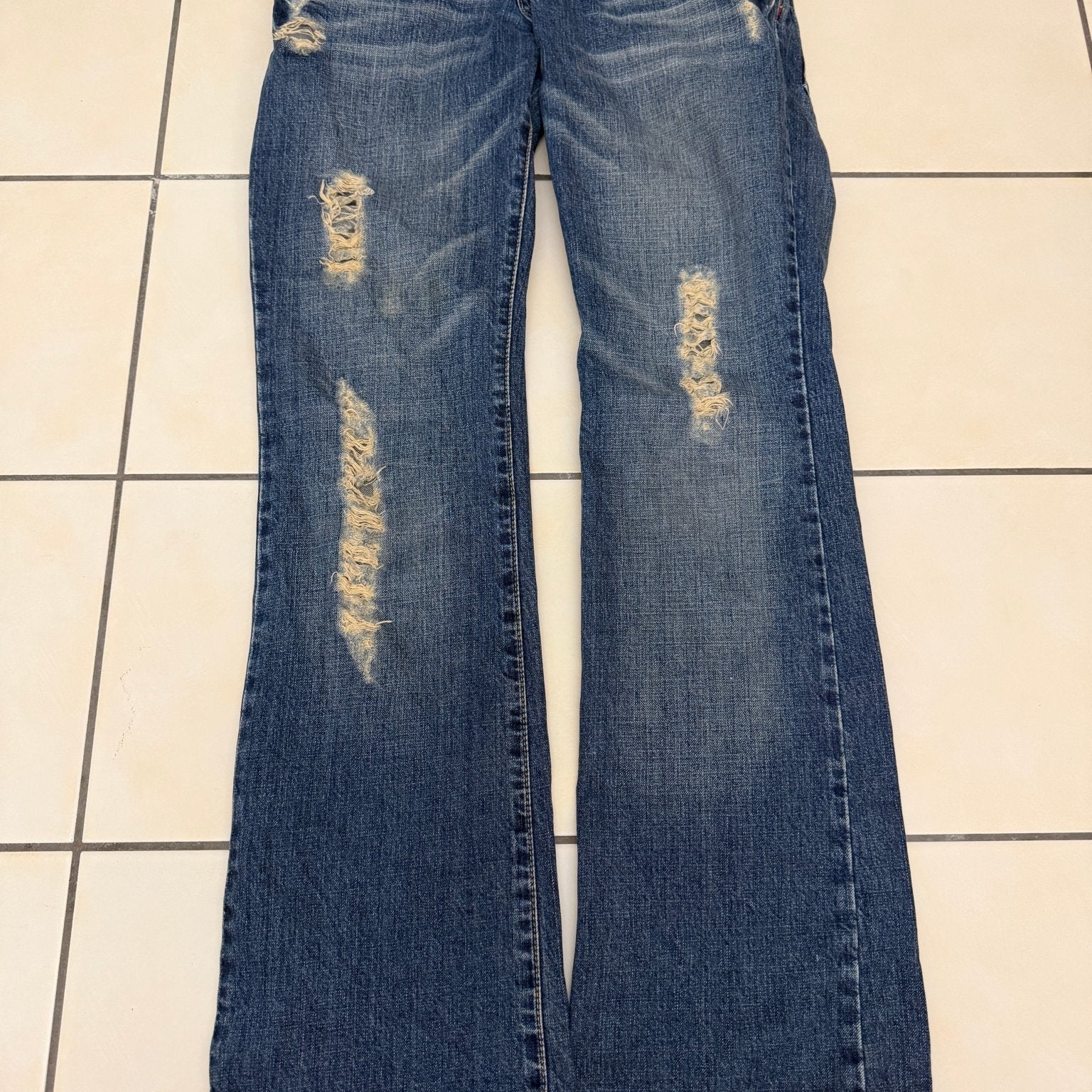 Tornado Mart Double Waisted Distressed Flared Pants - wintexarchive