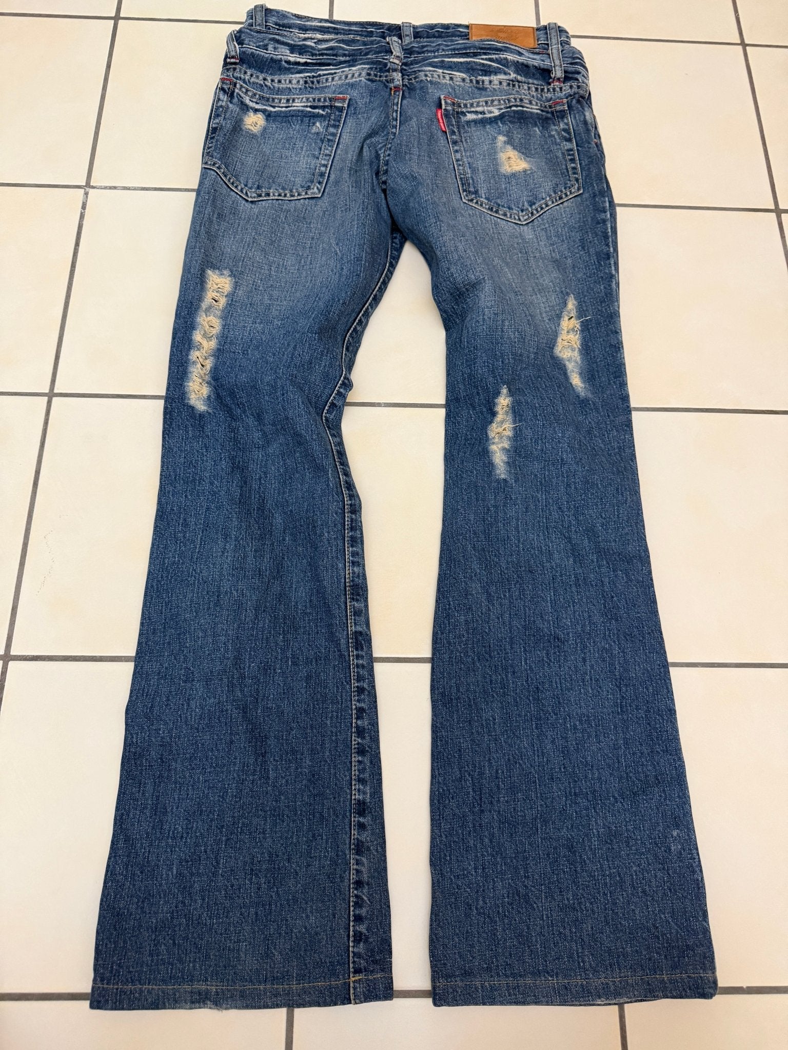 Tornado Mart Double Waisted Distressed Flared Pants - wintexarchive