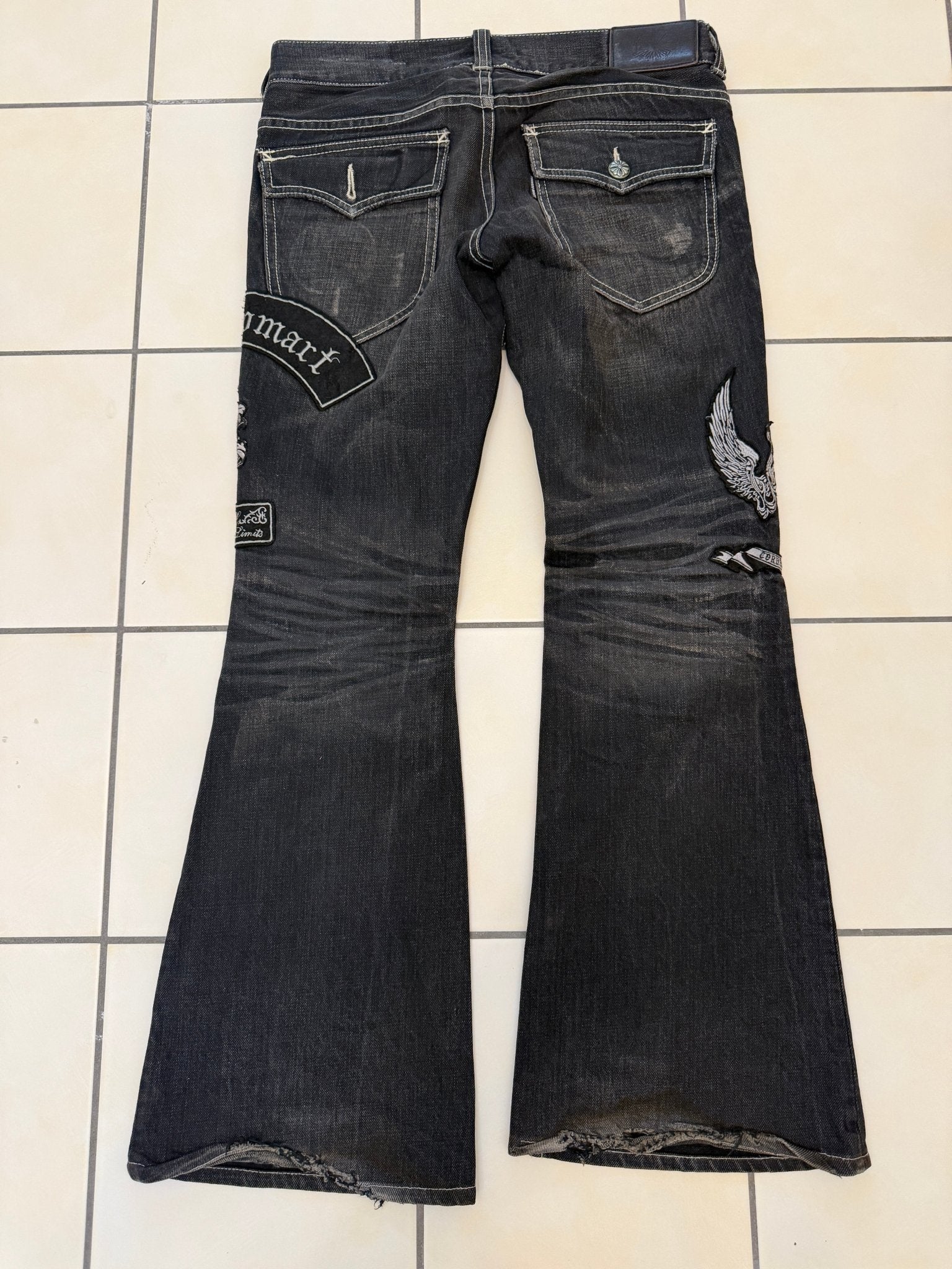 Tornado Mart Patched Flared Denims - wintexarchive